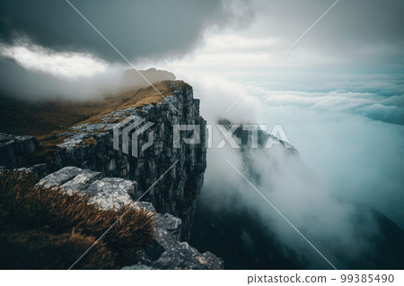 Edge of protruding cliff and sea of clouds Edge of protruding cliff and sea of clouds 99385490