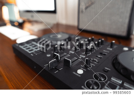 dj controller,DJ Spinning, Mixing, and Scratching in house 99385603