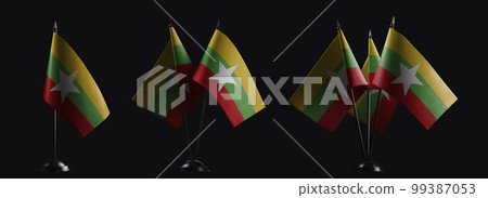 Small national flags of the Myanmar on a black background Small national flags of the Myanmar on a black background 99387053