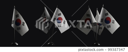 Small national flags of the South Korean on a black background Small national flags of the South Korean on a black background 99387347