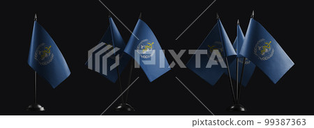 Small national flags of the World Health Organization WHO on a black background 99387363