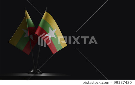 Small national flags of the Myanmar on a black background Small national flags of the Myanmar on a black background 99387420