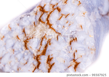 Macro mineral blue agate in the rock on white background Macro mineral blue agate in the rock on white background 99387925