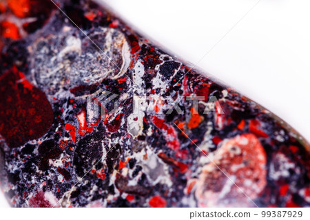 Macro mineral stone Jasper leopard on white background 99387929