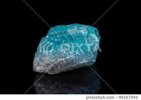 Macro mineral stone apatite on black background Macro mineral stone apatite on black background 99387949