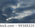 Dramatic sky with clouds at sunset 99388320