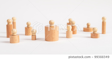 Montessori knobbed cylinders placed in random order. Puzzle pieces of different diameter and height. Wooden game for teaching children to visually discriminate between dimensions 99388349