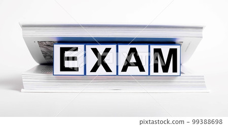 Exam, word inside school book, copybook Exam, word inside school book, copybook 99388698