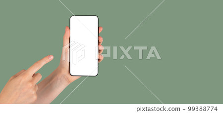Banner with finger pointing to phone mockup on green background. Android template with empty screen. Eco-friendly concept. Place for text Banner with finger pointing to phone mockup on green background. Android template with empty screen. Eco-friendly concept. Place for text 99388774