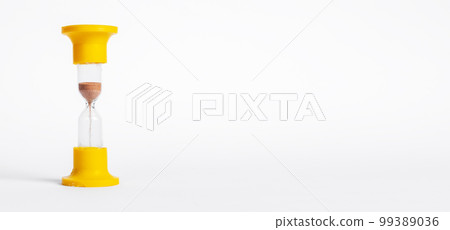 Banner with hourglass, sand clock. Time passage measurement, deadline concept. One minute interval. Copy space 99389036