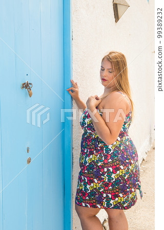 real woman with real body representative of diversity in a coastal area under the sun 99389232