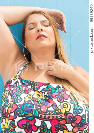 real woman with real body representative of diversity in a coastal area under the sun 99389240