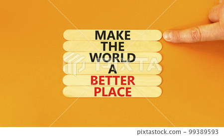 Make a better world symbol. Concept words Make the world a better place on wooden stick. Beautiful orange table orange background. Businessman hand. Business make a better world concept. Copy space. Make a better world symbol. Concept words Make the world a better place on wooden stick. Beautiful orange table orange background. Businessman hand. Business make a better world concept. Copy space. 99389593