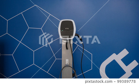 EV Charger quick charge type at car parking which DC Charging faster than AC system. EV Charger car station charging use AC socket plug for electric engine vehicle. Future transport energy technology 99389778