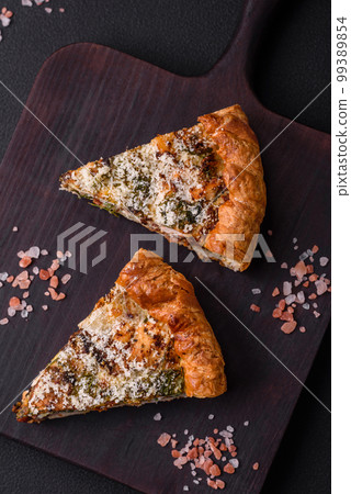 Delicious quiche with chicken, cheese, herbs, spices and herbs 99389854