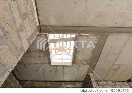 Construction of an individual residential building, an opening in monolithic reinforced concrete floors for stairs to the second floor Construction of an individual residential building, an opening in monolithic reinforced concrete floors for stairs to the second floor 99391795