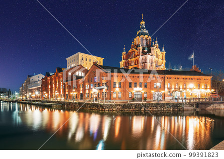 Helsinki, Finland. View Of Kanavaranta Street With Uspenski Cathedral In Evening Night Illuminations. Colourful Night Starry Sky In Dark Blue Colors. Sky Glowing Stars Background With Sky Gradient 99391823