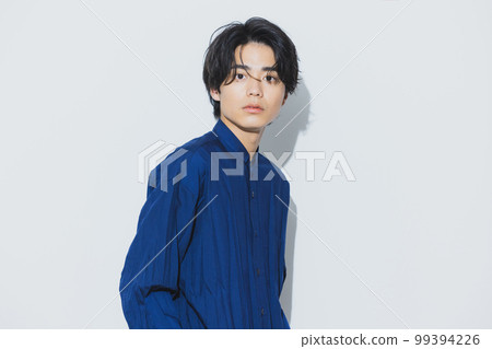 A man in a navy shirt 99394226