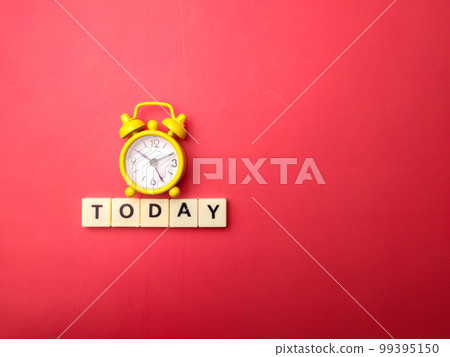 Yellow alarm clock with the word TODAY on a red background. Yellow alarm clock with the word TODAY on a red background. 99395150