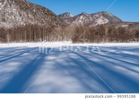 Snowy mountains and ranch Snowy mountains and ranch 99395186