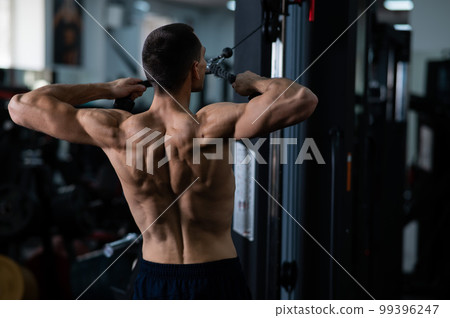 Man Thrust of the upper block to the chest in the gym. 99396247