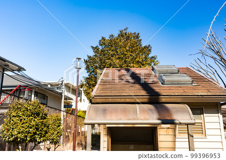 Slate roof of a public restroom in a park Slate roof of a public restroom in a park 99396953