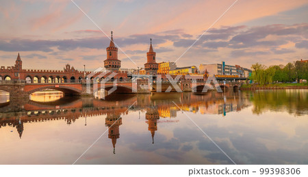 Berlin city skyline at Oberbaum Bridge and Spree River in Germany 99398306