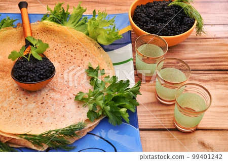Pancakes with black caviar, cooked for Maslenitsa 99401242