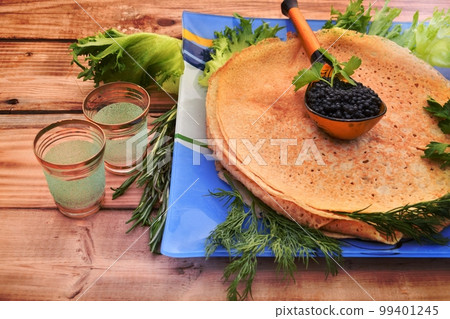Pancakes with black caviar, cooked for Maslenitsa 99401245