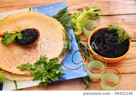 Pancakes with black caviar, cooked for Maslenitsa 99401246