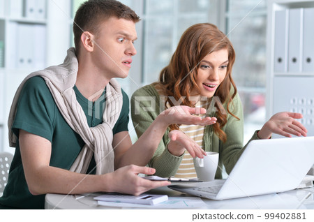young people working in office young people working in office 99402881