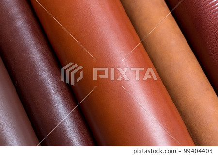 Natural shinny, glossy leather on rools, samples for fashion industry. 99404403