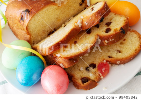 Easter eggs and cake still-life Easter eggs and cake still-life 99405842