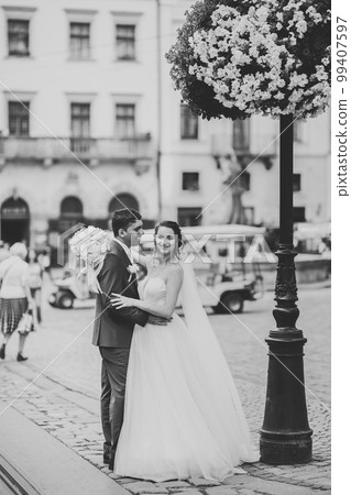 Beautiful couple walking on the European city 99407597
