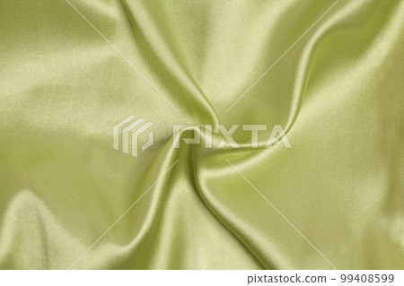 Smooth elegant light green silk or satin luxury fabric texture Top view Smooth elegant light green silk or satin luxury fabric texture Top view 99408599