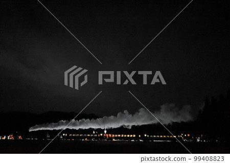 Night steam locomotive express train speeding through the dark night with white smoke Tobu Kinugawa Line illuminated Kuragasaki Night steam locomotive express train speeding through the dark night with white smoke Tobu Kinugawa Line illuminated Kuragasaki 99408823