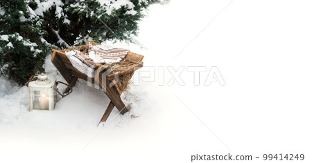 Manger with straw. Christmas background 99414249