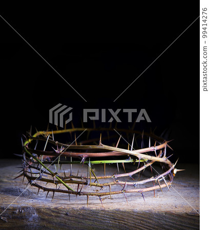 Rusty wreath of thorns at the cross 99414276