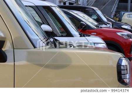 Cars on display at car dealers 99414374