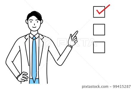 A male doctor in a white coat pointing to a checklist 99415287