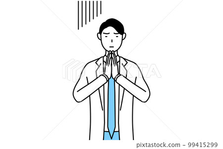 A male doctor in a white coat who puts his hands together in front of his body and apologizes 99415299