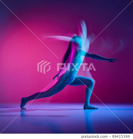 Expressive contemp. Young woman dancing in bodysuit over gradient pink studio background in neon with mixed lights. Concept of dance aesthetics, art 99415399