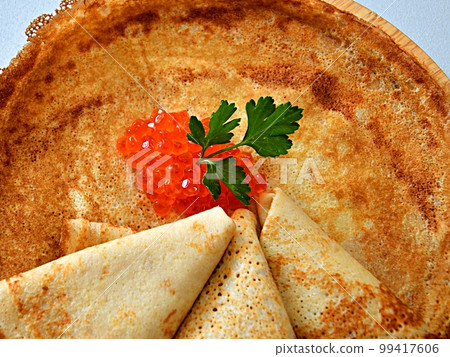 Pancakes with red caviar, cooked for Maslenitsa Pancakes with red caviar, cooked for Maslenitsa 99417606