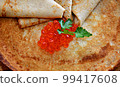 Pancakes with red caviar, cooked for Maslenitsa 99417608