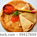 Pancakes with red caviar, cooked for Maslenitsa 99417609