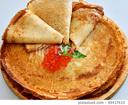 Pancakes with red caviar, cooked for Maslenitsa 99417610