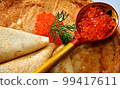 Pancakes with red caviar, cooked for Maslenitsa 99417611
