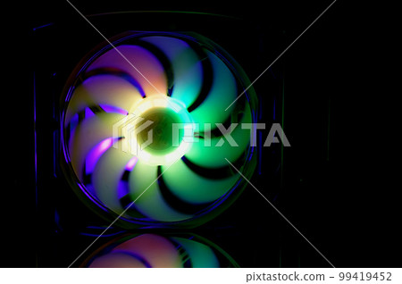 Computer cooler with RGB LED light. Computer circuit board and CPU cooling fans illuminated 99419452