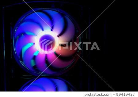 Computer cooler with RGB LED light. Computer circuit board and CPU cooling fans illuminated 99419453