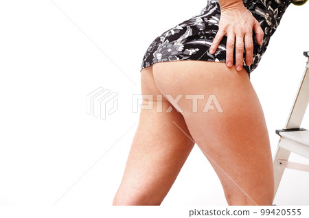 Sexy woman in a short dress Sexy woman in a short dress 99420555